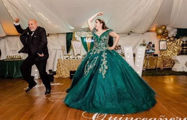 Quinceañera party on dance floor under tent in Michigan